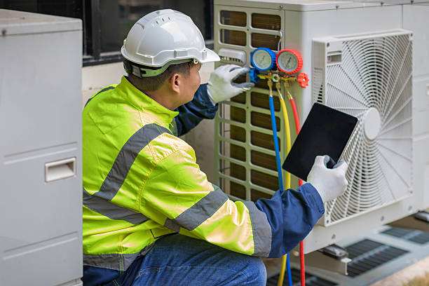 Professional Air Conditioning Repair technician working in Roanoke, IN